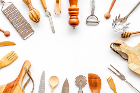 Cookware frame as instruments for cooking on white background top view copy space
