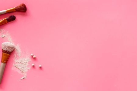 Brushes for make up on pink visagiste work desk background top view copyspaceの写真素材