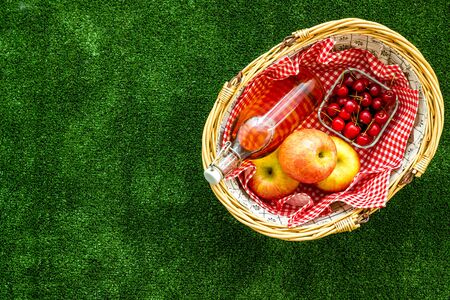 picnic in summer with products, fruits, drinks and hat on white background top view space for textの写真素材