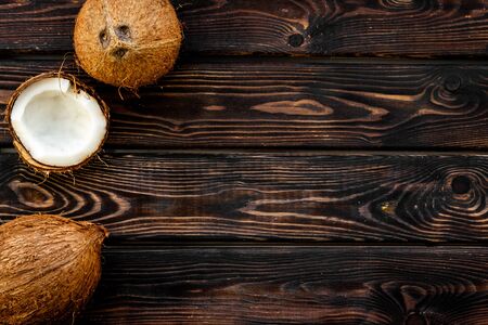 Coconut for cosmetic in body treatment concept on wooden background top view copyspaceの写真素材