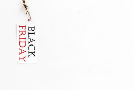 Black friday labels on white background top view mockupの写真素材