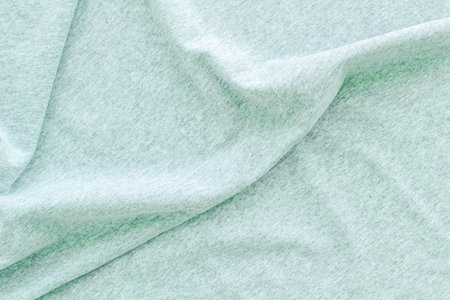 Abstract design. Pattern for blog with mint green fabric texture top view copyspace