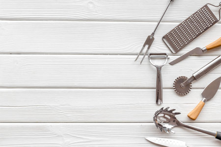 Chef work desk. Cookware mockup on white wooden background top view
