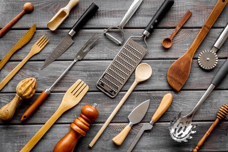 Tools and equipment for cooking. Pattern of cookware for chef work on wooden background top view.の写真素材