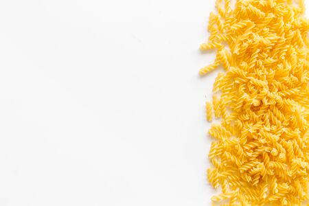 Organic homemade Italian pasta for restaurant on white table background top view space for textの写真素材