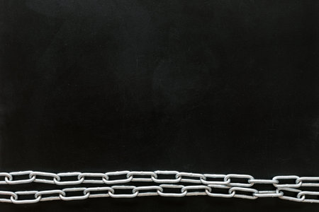 Chain for protection concept on black background top view mockup