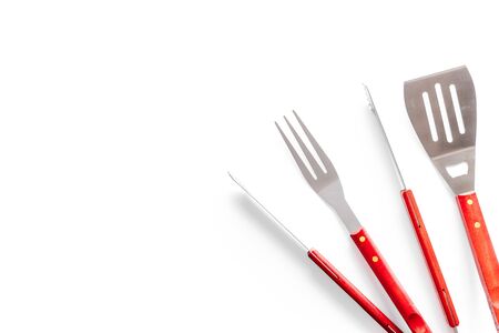 spatula, fork, tongs for barbecue on white background top view mockupの写真素材