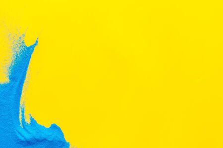 Blog or presentation background with blue sand texture on yellow background top view space for textの写真素材