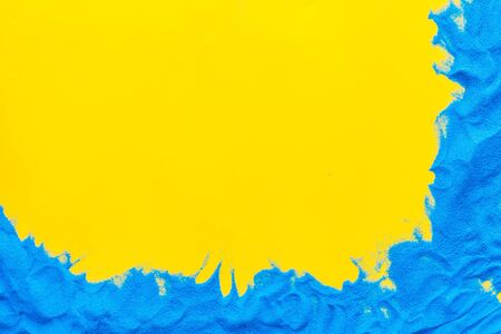 Blog or presentation background with blue sand texture on yellow background top view space for textの写真素材