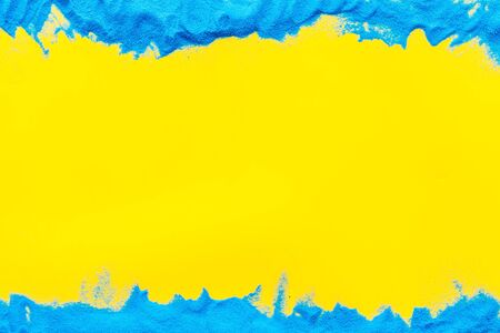 Modern frame for blor with blue sand texture on yellow background top view mock upの写真素材