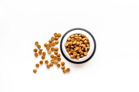 Cat dry food in bowl on white background top view mock upの写真素材