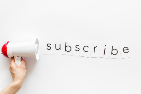 announce with subscribe copy and megaphone on white background top view