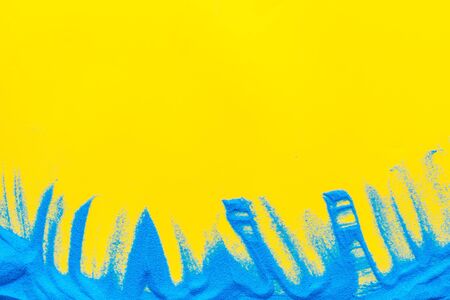 Modern design for blor with blue sand texture on yellow background top view mock upの写真素材