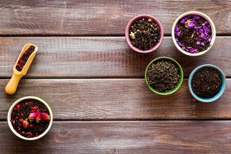 different tea for brew frame on wooden background top viewの写真素材