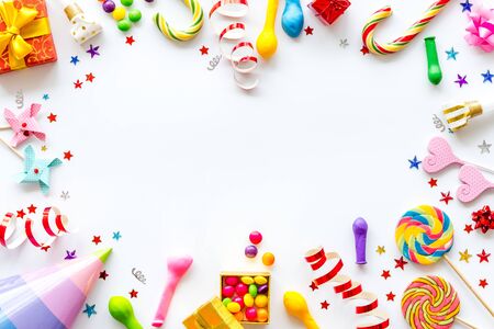 party time frame with decorations on white background top view mock upの写真素材