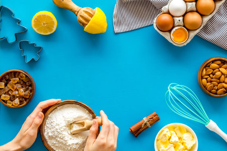 Baking frame with flour, eggs and other ingredients top view.