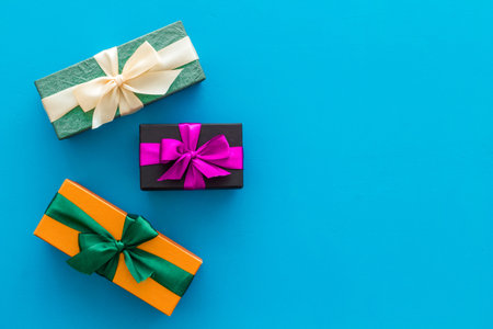 frame from boxes with presents on blue background top view mockup