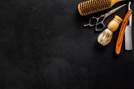 Mens hairdressing. Equipment on black background top view space for textの写真素材