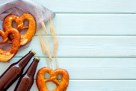 Pretzels near wheat and beer bottles top viewの写真素材