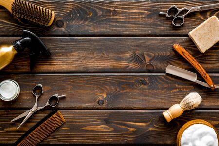 Mens shaving accessories on dark wooden background top view space for textの写真素材