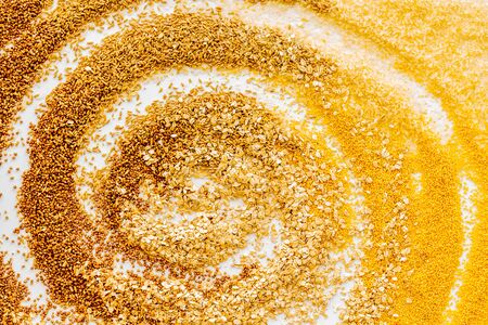 Cereals background with drawn spiral top view copy spaceの写真素材