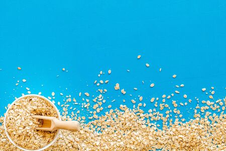 Oatmeals background on blue table top view frame copy spaceの写真素材