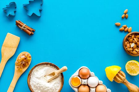 Baking ingredients on blue background top view space for textの写真素材