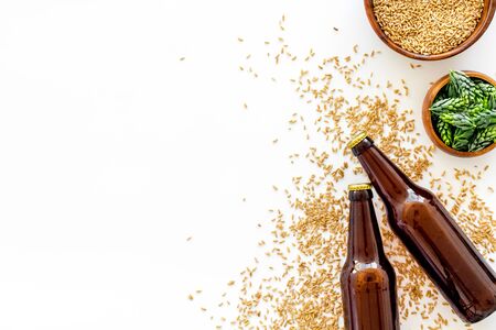 Barley and hop for making beer on white background top view copy spaceの写真素材