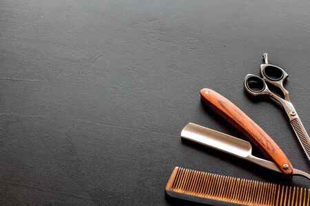 Mens hairdressing. Equipment on black background top view space for textの写真素材
