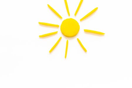 Sunny weather concept. Sun on white background top view.の写真素材