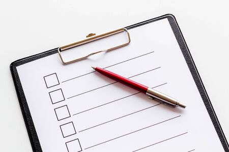 Empty check list ready to fill on white background top viewの写真素材