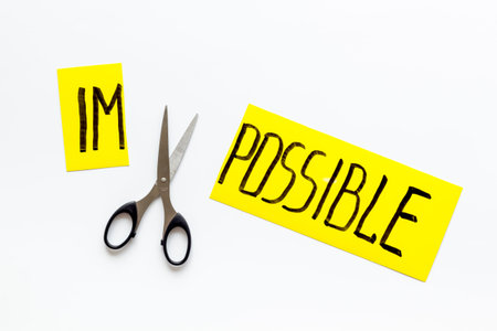 All is possible concept. Cut word impossible near scissors on white background.の写真素材