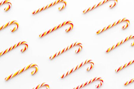 Christmas candy cane pattern on white background top-downの写真素材
