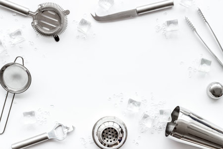 Bar utensil, tools - shaker, stainer - on white background top-down frame copy spaceの写真素材