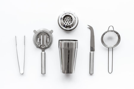 Bartender equipment set with shaker and stainer on white background top-down pattern.の写真素材