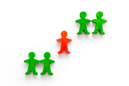 Leader concept. People cutuots - red figure against others on white background top-down.の写真素材