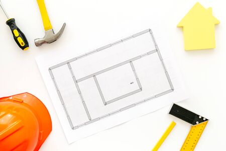 House building plan. Blueprints, instruments, helmet on white background top-down.の写真素材