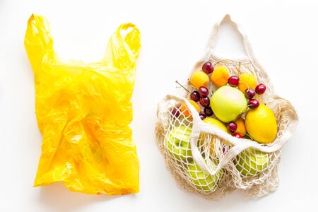 Zero waste concept. Textile and plastic bag on white background top-downの写真素材
