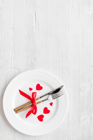 Valentines day table. Plate on white background top-down copy spaceの写真素材