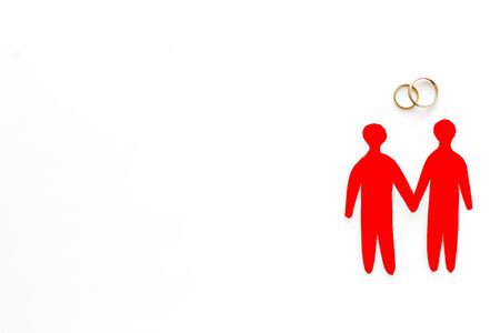 LGBT wedding. Male couple and rings on white background top-down copy spaceの写真素材