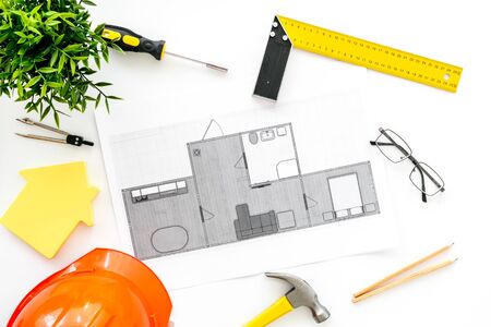 House building plan. Blueprints, instruments, helmet on white background top-down.の写真素材