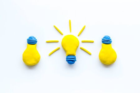 Creativity concept. Bulb icons on white background top-down.の写真素材