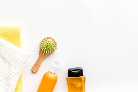 Bath cosmetics for hair. Shampoo, and balm on white background top-down.の写真素材