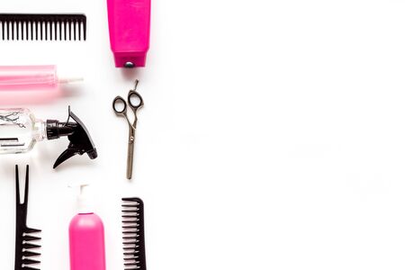Beauty saloon concept. Hairdresser accessories pattern on white background top-down.