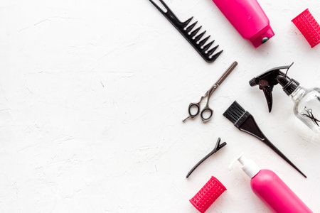 Beauty saloon concept. Hairdresser accessories pattern on white background top-down frame copy space