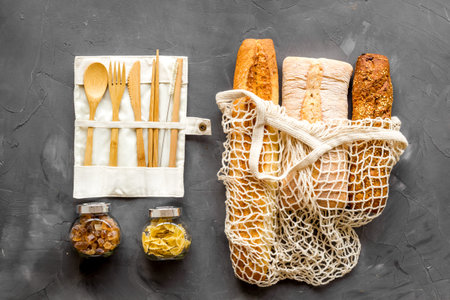 Zero waste food shopping. Cotton bags, glass and wooden jars with groceries. Eco friendly, plastic...