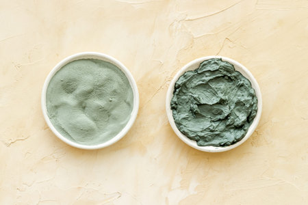 Blue cosmetic clay on beige background top-downの写真素材