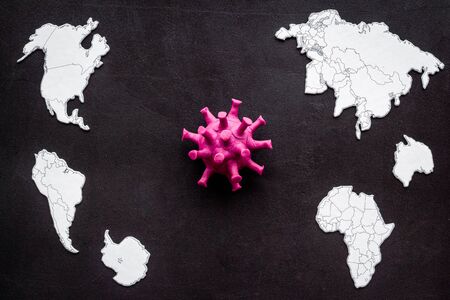 Corona virus Covid-19 - epidemic concept with world map - on black background top-downの写真素材