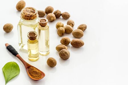 Nutmeg oil - aromatherpy concept - on white background.の写真素材