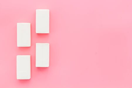 Soap bars flat lay on pink background top-down.の写真素材